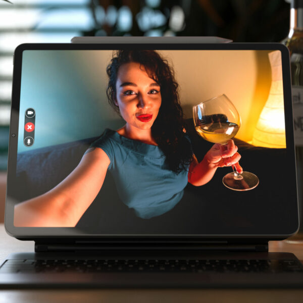 Woman,Talking,From,Tablet,By,Video,Chat,To,Her,Friend